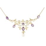 An Edwardian amethyst and seed pearl necklace of open scrolling design, set throughout with seed
