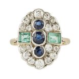 A multi-gem set plaque ring of oval form, collet set with three round cut sapphires, flanked to