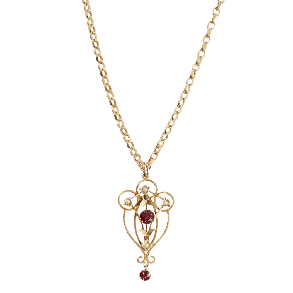 An Edwardian garnet and seed pearl set pendant of open scrolling design, set with seed pearls and - Image 2 of 4