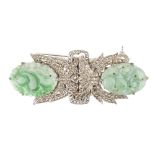 An Art Deco marcasite and jade set double clip brooch of symmetrical form, each half with a carved