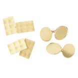 A pair of 18ct gold cufflinks of oval outline with engine turned detail to principal terminal,