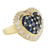A sapphire and diamond set cluster ring modelled as a heart, pavé set with calibre cut sapphires