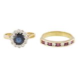 A sapphire and diamond cluster ring the round mixed cut sapphire within a surround of round