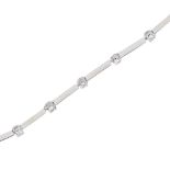 A contemporary 18ct white gold and diamond set line necklace claw set with thirty-two round