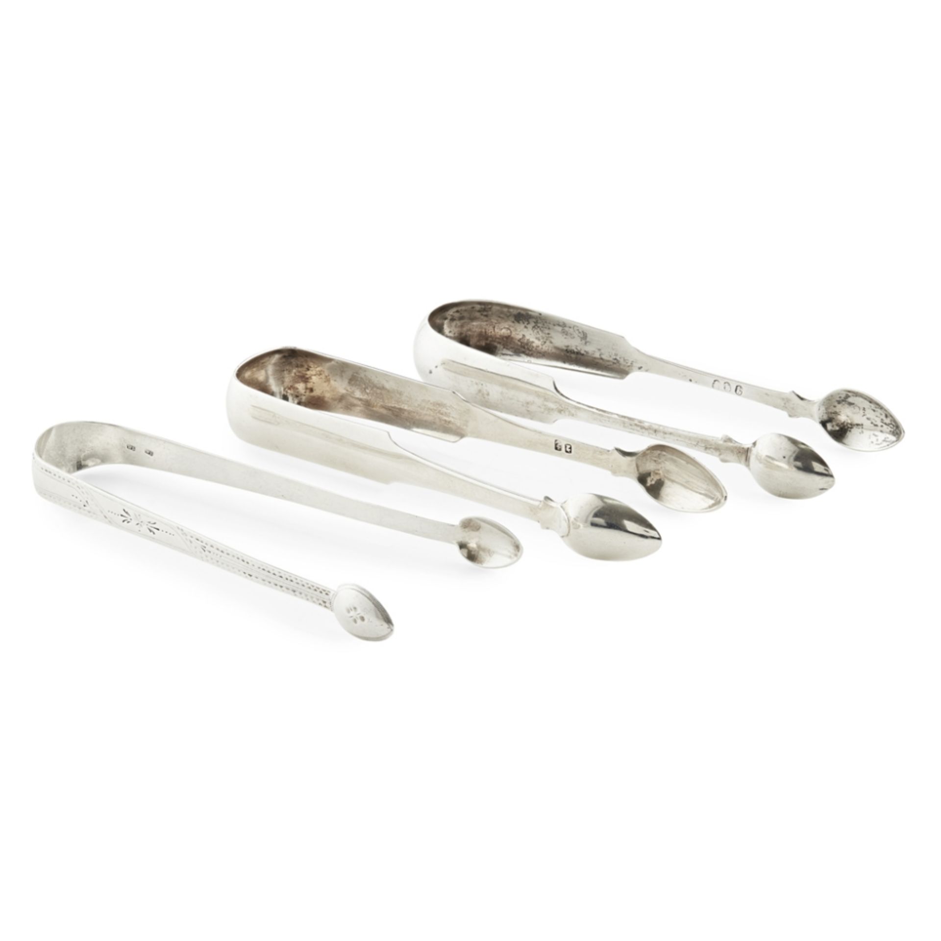 A GROUP OF SCOTTISH PROVINCIAL SUGAR TONGS to include a Fiddle pattern pair by D Gray of Dumfries, a