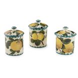 TWO WEMYSS WARE PRESERVE JARS AND COVERS 'ORANGES' AND 'YELLOW PLUMS' PATTERNS, EARLY 20TH CENTURY