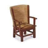 A CHILD'S OAK-FRAMED ORKNEY CHAIR EARLY 20TH CENTURY the curved woven straw back above open arms and