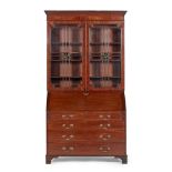 A SCOTTISH REGENCY MAHOGANY BUREAU BOOKCASE EARLY 19TH CENTURY the straight moulded cornice above