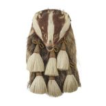 A BADGER MASK SPORRAN the mask sporran with folding access to pouch, six hair tassels, gilt brass