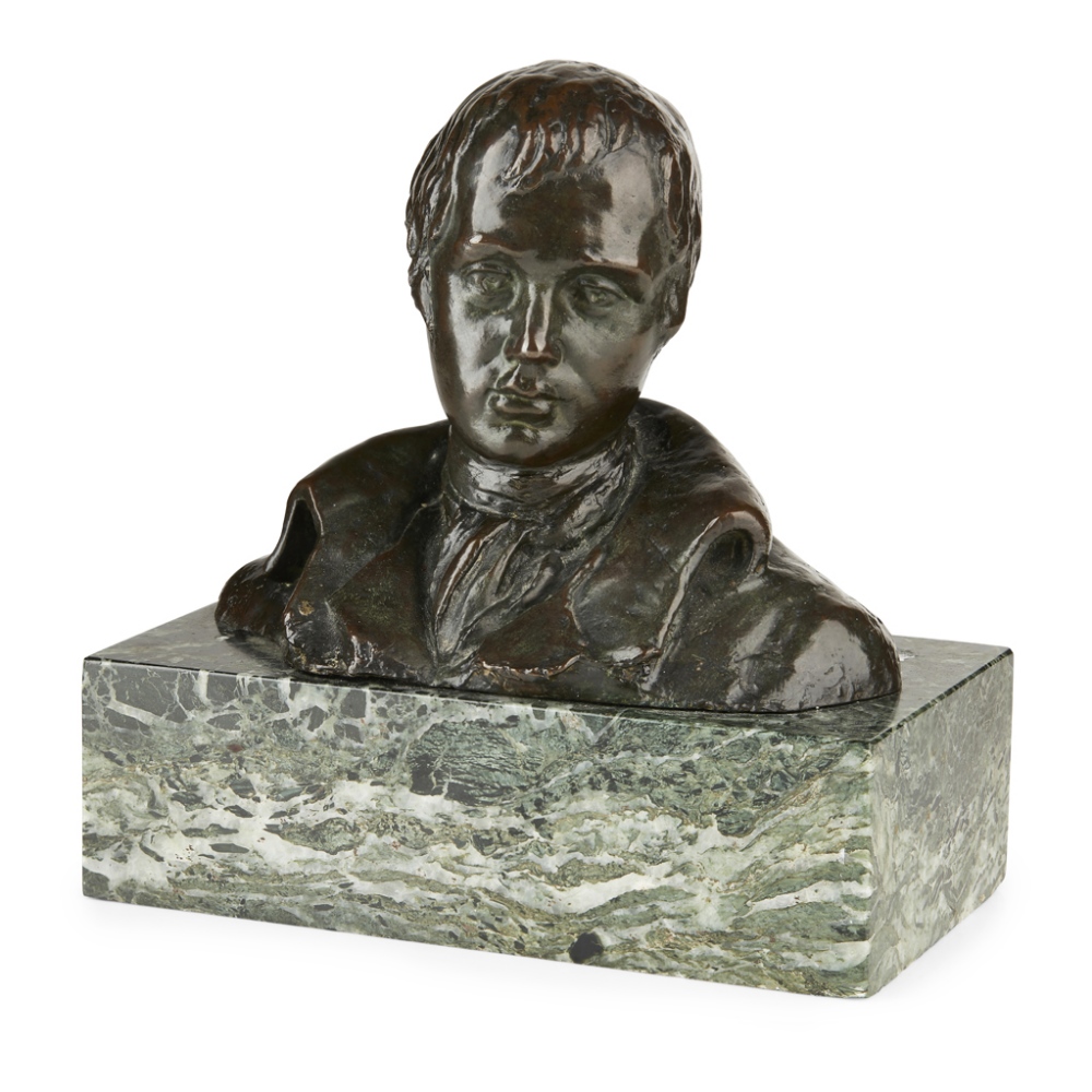 A BRONZE BUST OF ROBERT BURNS LATE 19TH CENTURY mid-brown patina, raised on a green marble base 16cm