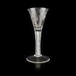 A JACOBITE WINE GLASS MID-18TH CENTURY the drawn trumpet bowl engraved with a displayed rose head