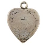 A RARE RELIQUARY PENDANT FOR KING JAMES II the silver heart-shaped pendant with pull-off cover,