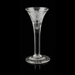 A JACOBITE ENGRAVED WINE GLASS MID-18TH CENTURY the drawn trumpet bowl engraved with open rose