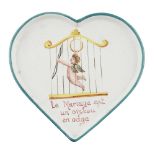 A WEMYSS WARE HEART SHAPED DISH EARLY 20TH CENTURY decorated by James Sharp, depicting cupid holding
