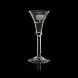 A JACOBITE ENGRAVED WINE GLASS the slender trumpet bowl engraved with open rose head and empty