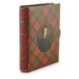 A MAUCHLINE TARTANWARE PHOTOGRAPH ALBUM CIRCA 1890 the boards in Stuart tartan with central oval
