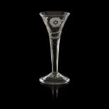 A JACOBITE WINE GLASS MID-18TH CENTURY the drawn trumpet bowl, with engraved displayed rose head