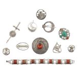 A COLLECTION OF SCOTTISH SILVER JEWELLERY to include seven brooches of various designs, agate set