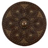 A LEATHER AND BRASS STUDDED REPRODUCTION TARGE the wooden body with leather covered front, the domed