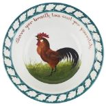 A RARE WEMYSS WARE PORRIDGE BOWL CIRCA 1900 depicting a brown cockerel within a moulded leafy