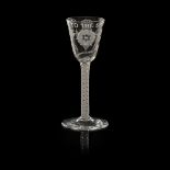 A JACOBITE WINE GLASS MID-18TH CENTURY the bucket bowl engraved with open rose head flanked by