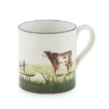 A SMALL WEMYSS WARE MUG 'COWS' PATTERN, EARLY 20TH CENTURY impressed mark WEMYSS, printed retailer's