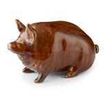 A SMALL WEMYSS WARE PIG CIRCA 1900 covered in a brown glaze, impressed mark WEMYSS WARE/ R. H. &