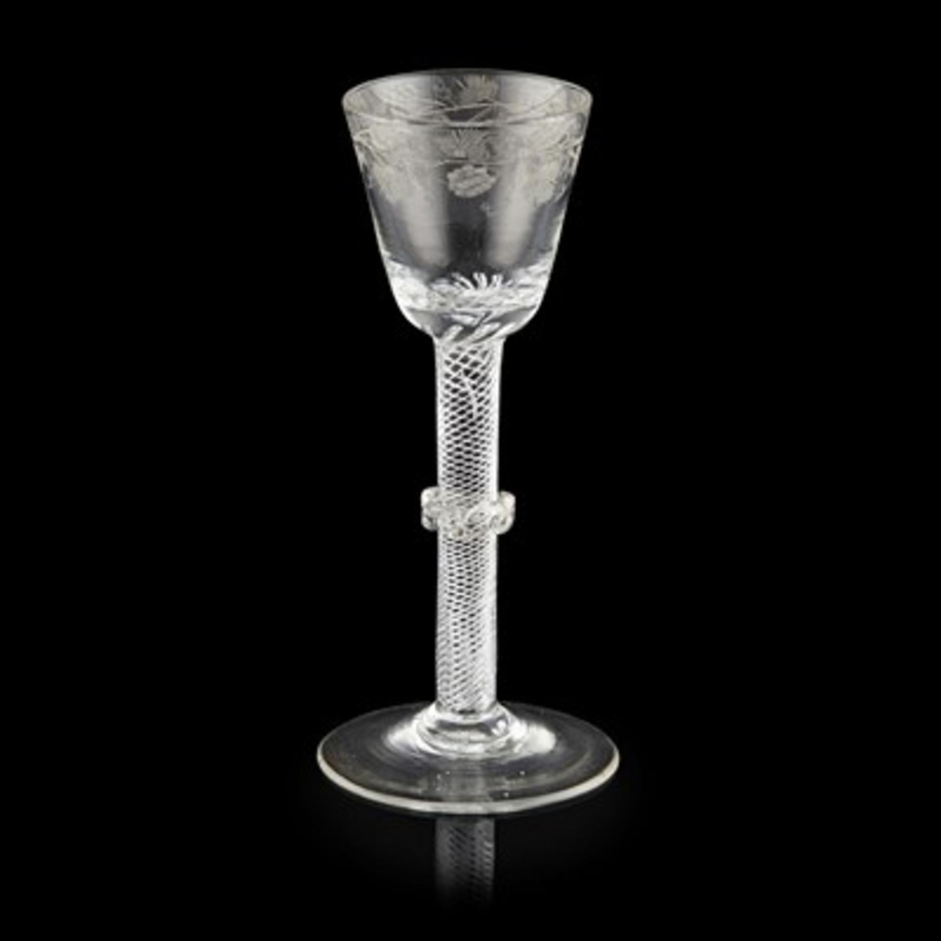 GEORGIAN ENGRAVED TWIST STEM WINE GLASS CIRCA 1750 with a round funnelled bowl engraved with