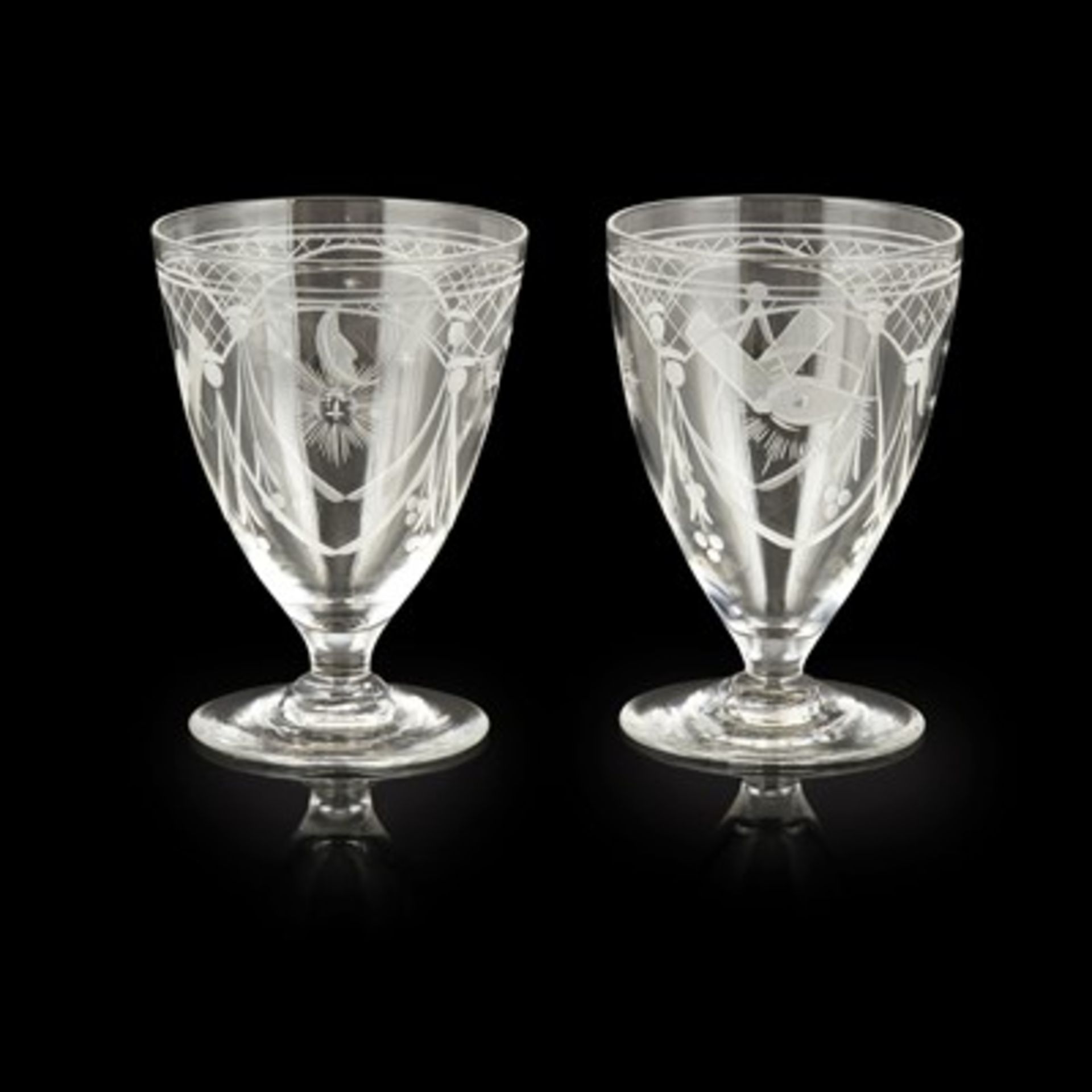 PAIR OF VICTORIAN ENGRAVED MASONIC RUMMERS 19TH CENTURY with wide bowls tapering to conical feet,