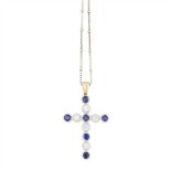 A 18ct gold sapphire and diamond set cross the cross composed of six collet set sapphires and five