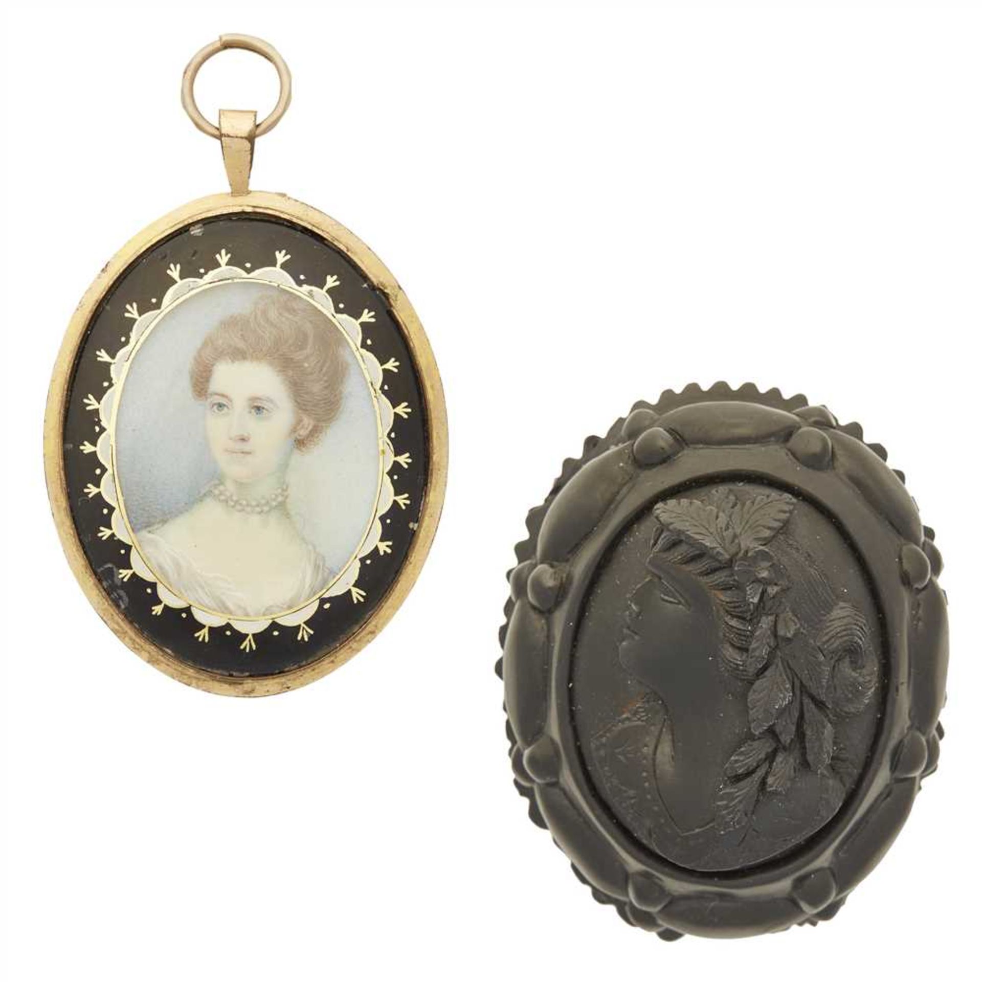 A Regency miniature presented in an oval frame with black enamel detail; together with a jet cameo