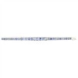 A sapphire set bracelet each graduated link claw set with an oval or cushion cut sapphire, to a