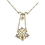 An early 20th century enamel and gem set pendant necklace the pendant of pierced scrolling design,