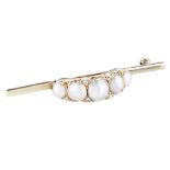 A pearl and diamond set brooch the central domed section claw set with five graduated pearls,