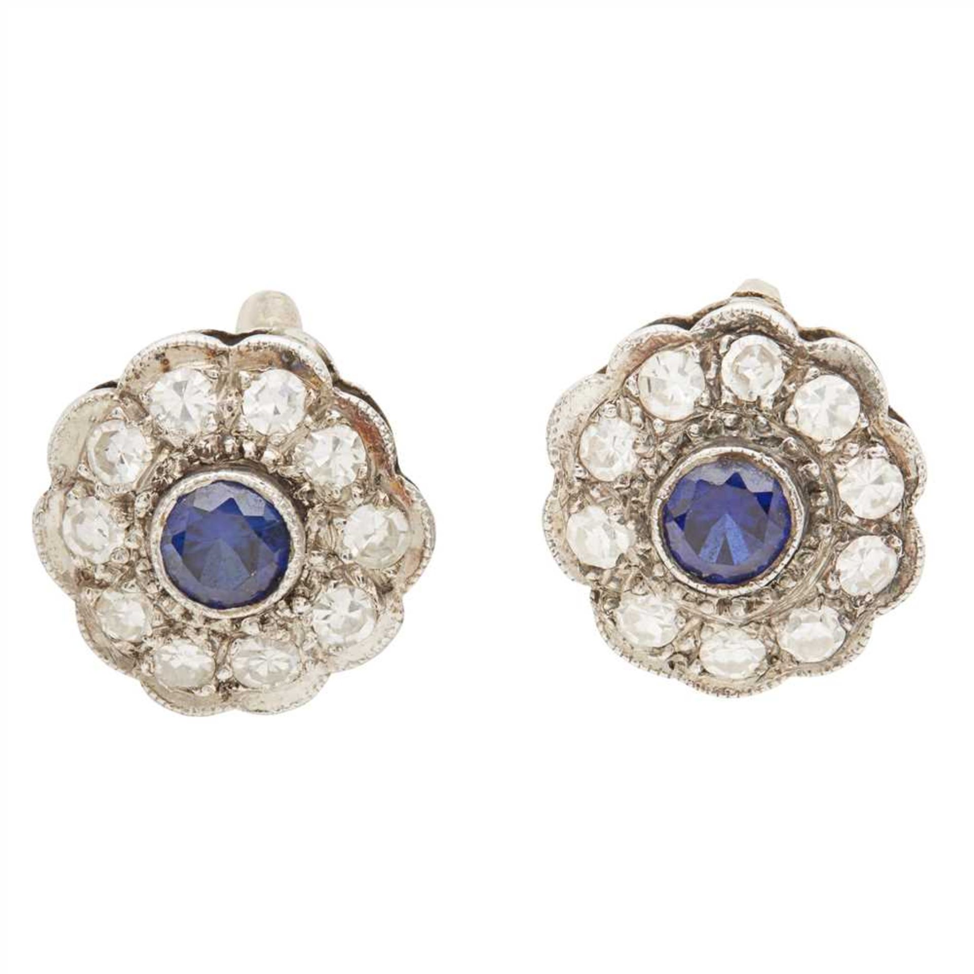 A pair of sapphire and diamond set earrings collet set with a circular cut sapphire in a border of - Image 2 of 3