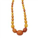 An amber bead necklace composed of a single strand of graduated amber beads (Dimensions: Length: