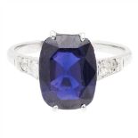 An unheated colour-change sapphire claw set with an oval cushion-cut unheated purplish-blue colour-