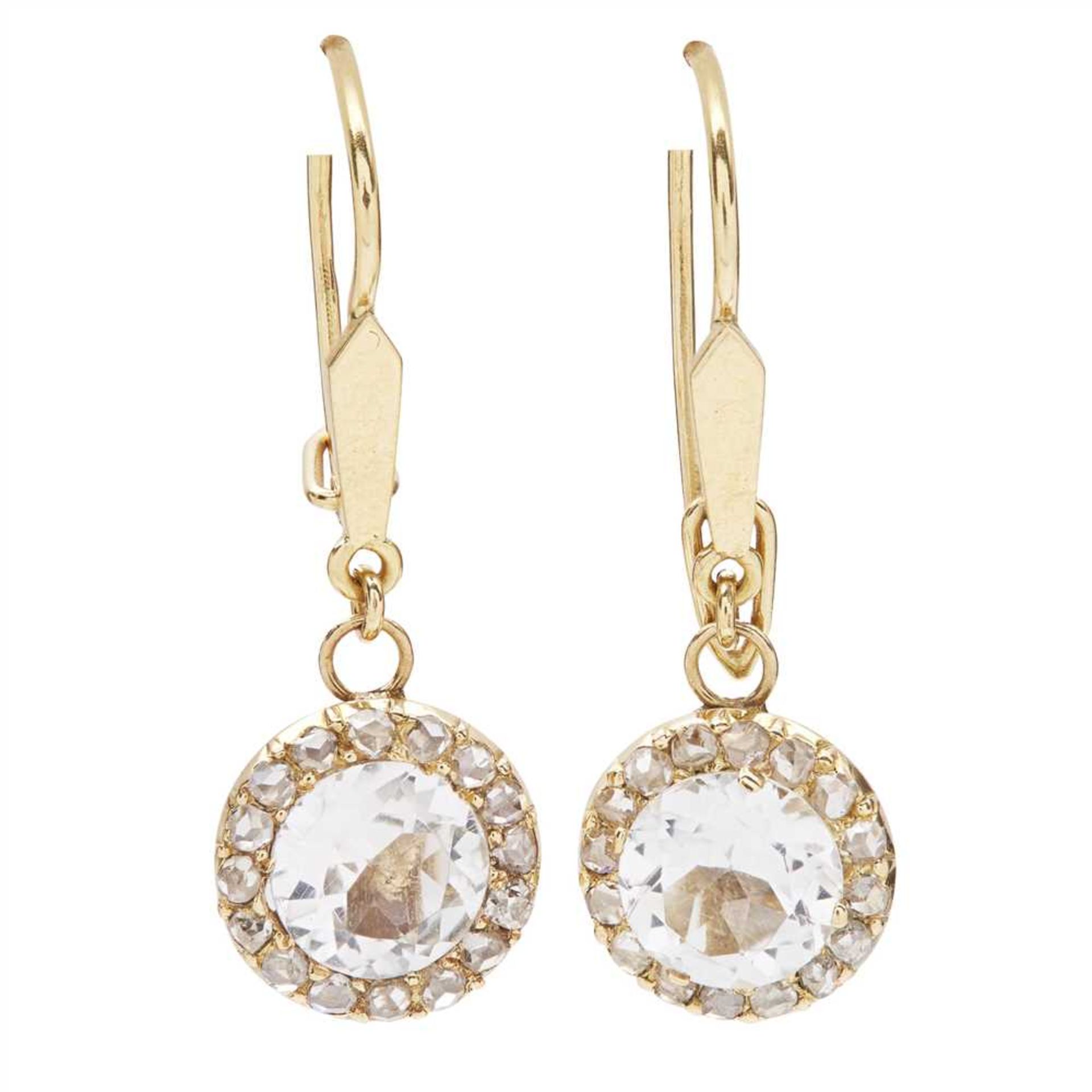 A pair of topaz and diamond cluster earrings each claw set with a round cut colourless topaz, in a