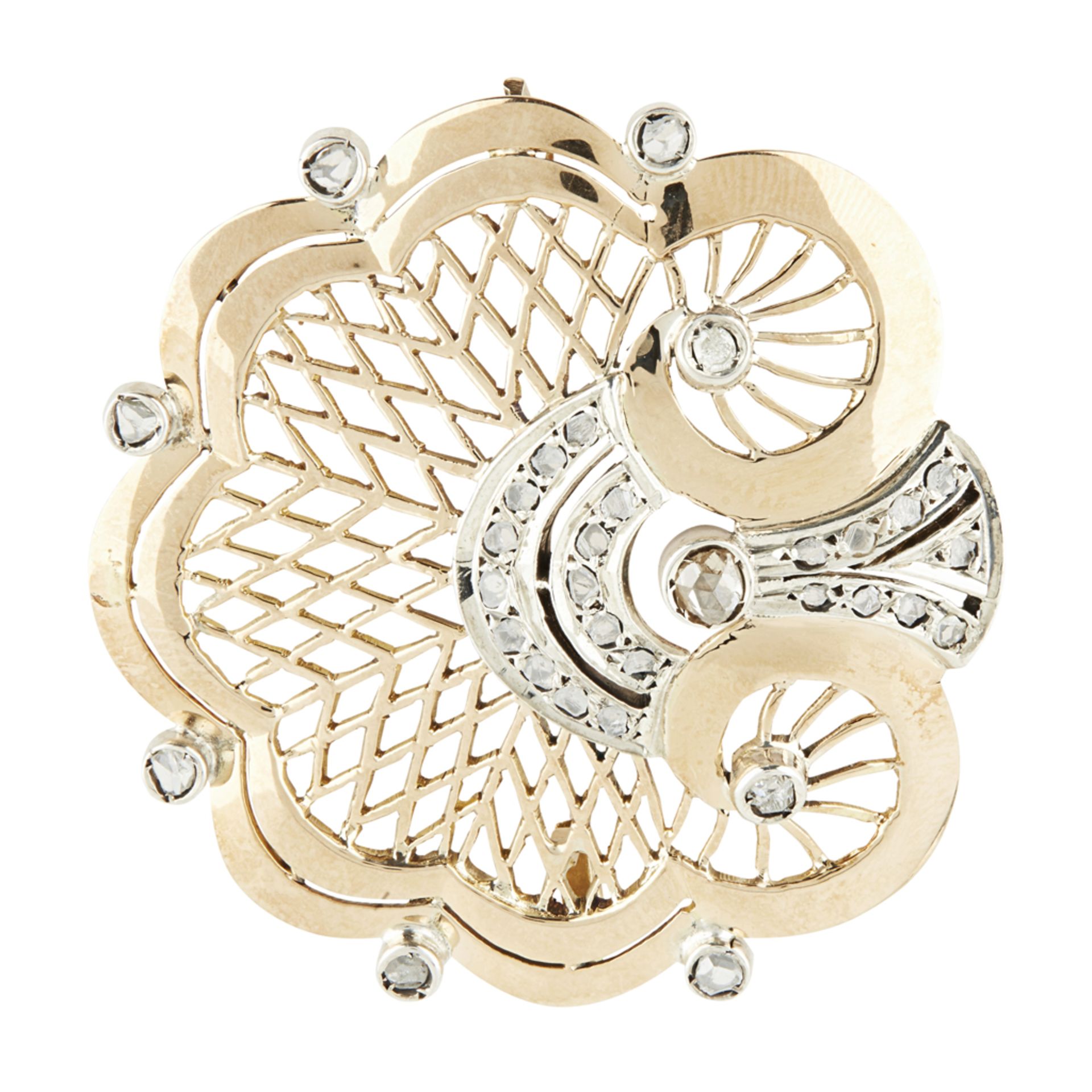 A mid-century diamond set brooch modelled as a stylised shell with pierced detail, rose cut