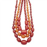 A graduated amber bead necklace composed of a single strand of slightly graduated amber beads;