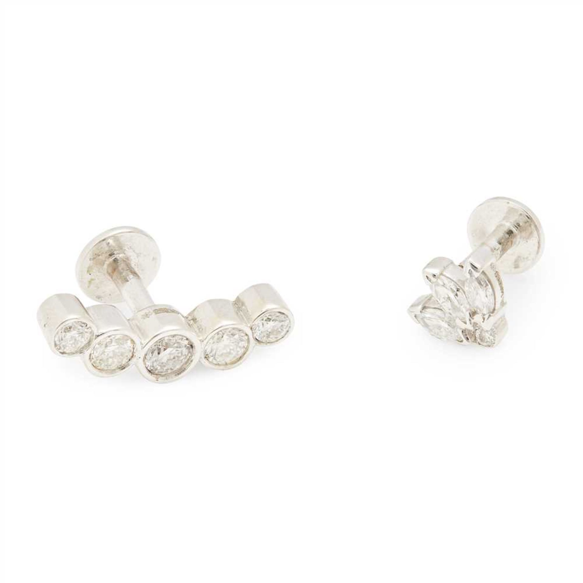 Two diamond set studs the first of curved design, collet set with five graduated round brilliant cut