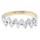 A diamond set half-eternity ring claw set with two rows of round brilliant cut diamonds, to a
