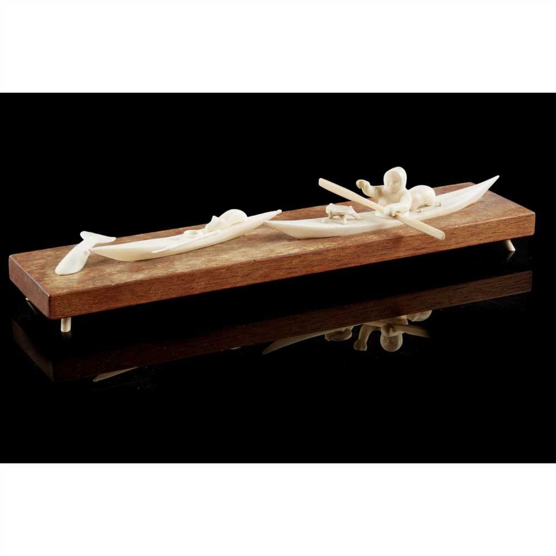 INUIT HUNTING SCENE GREENLAND wood and marine ivory, two kayaks, one with a hunter on board, the