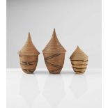 THREE TUTSI BASKETS RWANDA woven grass, miniature baskets with lids evoking an architectural form,