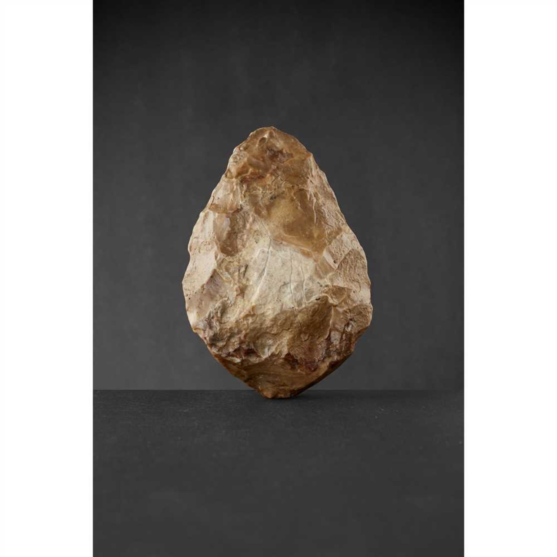 ACHEULEAN HANDAXE WESTERN EUROPE, PALAEOLITHIC knapped flint, the caramel stone of teardrop shaped - Image 2 of 2