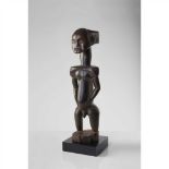 EX MERTON SIMPSON HEMBA ANCESTOR FIGURE DEMOCRATIC REPUBLIC OF CONGO carved wood, standing on a