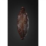 MAORI TREASURE BOX, WAKA HUIA NEW ZEALAND carved wood, of canoe shaped form, with a carved tiki at