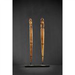 ACQUIRED EARLY 20TH CENTURY TWO NIAS HAIR PINS NIAS ISLAND, INDONESIA bone, with a slight curve, bo