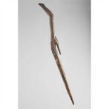 IATMUL BACK ORNAMENT MIDDLE SEPIK, NEW GUINEA carved wood, shown with a long slender body, the