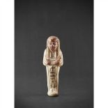 ANCIENT EGYPTIAN SHABTI EGYPT, 19TH DYNASTY, THIRD INTERMEDIATE PERIOD white faience with red and